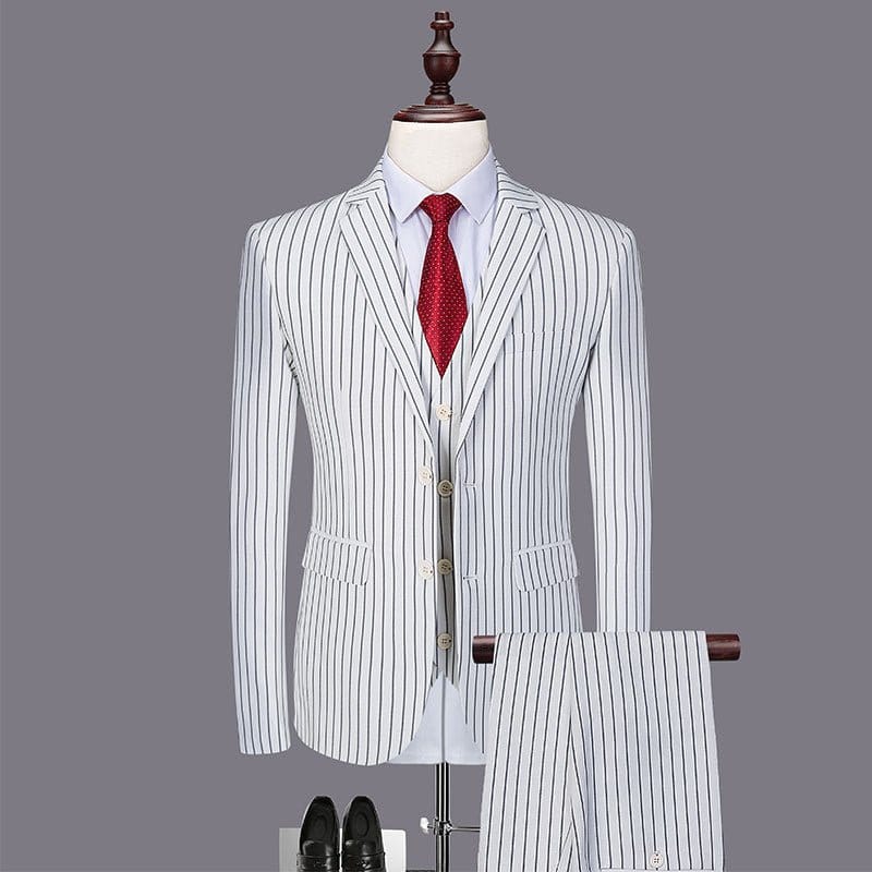 striped three-piece suit for men displayed with a red tie and black shoes, showcasing a fashionable urban style.