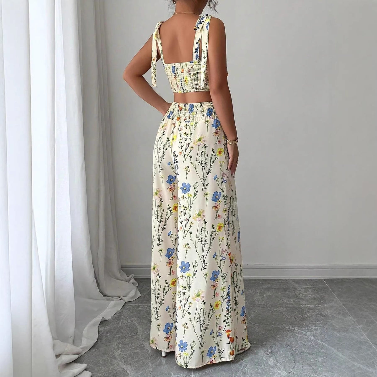 womens pyjama set printed camisole featuring floral design and stylish full-length pants.