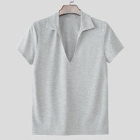 Men's breathable v-neck short sleeve top in gray color on a hanger against a light background.