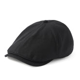 Retro beret cap for men and women, stylish black cotton cap for casual wear and comfort.