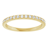 diamond anniversary band featuring round diamonds set in 14K yellow gold, symbolizing eternal love and elegance.