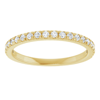 diamond anniversary band featuring round diamonds set in 14K yellow gold, symbolizing eternal love and elegance.