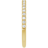 diamond anniversary band crafted in 14K yellow gold with round diamonds in a classic French-set design.