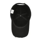 Interior view of black vintage baseball cap for men showcasing adjustable fit and stitching details.
