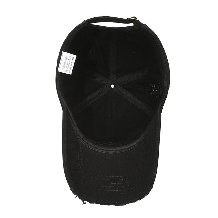 Interior view of black vintage baseball cap for men showcasing adjustable fit and stitching details.