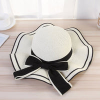 beach hats for women stylish straw hat with black bow for sun protection and fashion at the beach