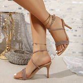Rhinestone high heels for women featuring elegant design and fine heel, perfect for stylish occasions.