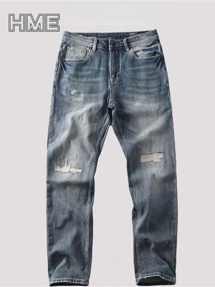 Shanxi stretchy slim straight pants with distressed denim design and light wash finish.