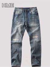 Shanxi stretchy slim straight pants with distressed denim design and light wash finish.