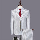 Mens fashionable and versatile striped three-piece suit for men in gray wide stripe with red tie and shoes