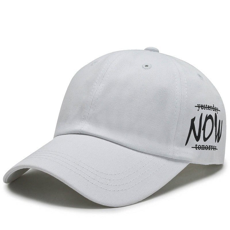 White baseball cap with embroidered text 'NOW' and a sun-proof design, suitable for four seasons baseball cap enthusiasts.