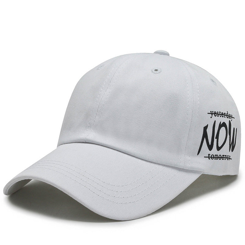 White baseball cap with embroidered text &