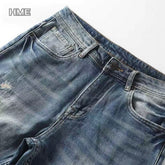 Shanxi stretchy slim straight pants showing detailed denim texture and design.