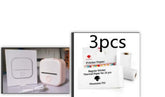 Portable mini label printer with packaging and thermal paper rolls for easy printing.