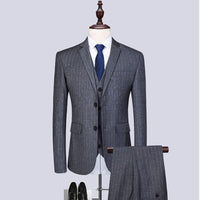 striped three-piece suit for men in gray with matching trousers and formal shoes, ideal for banquets.