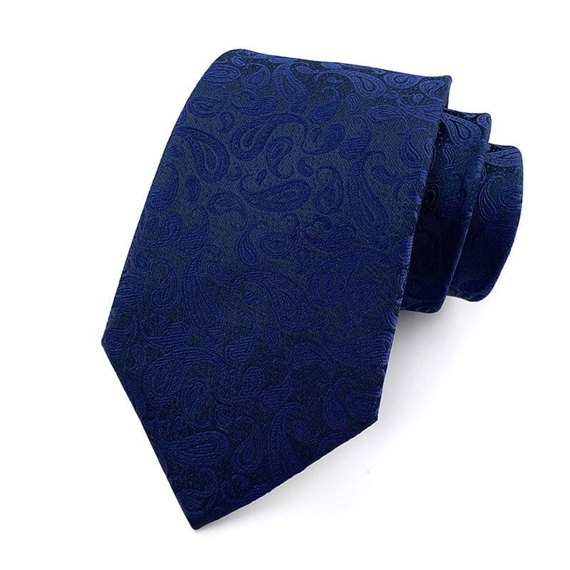 Mens jacquard woven business casual tie in dark blue with floral jacquard pattern and arrow-shaped design.
