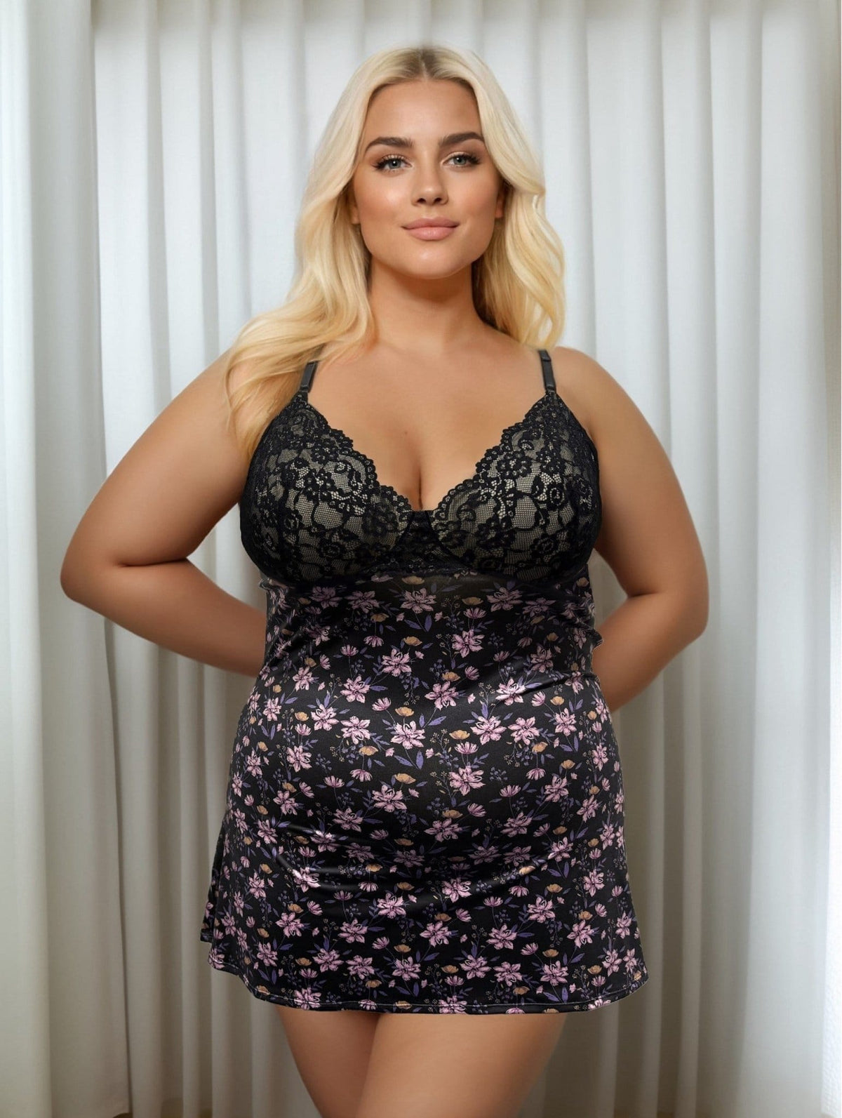 sleepwear for women featuring a pink floral printed chemise with lace detail bust modelled by a plus-size woman