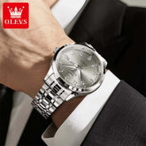 Luxury Watch for Men Automatic Mechanical Wristwatches Classic Men Watch Waterproof Gray Dial Luxury Brand Date Week 7077 on wrist.