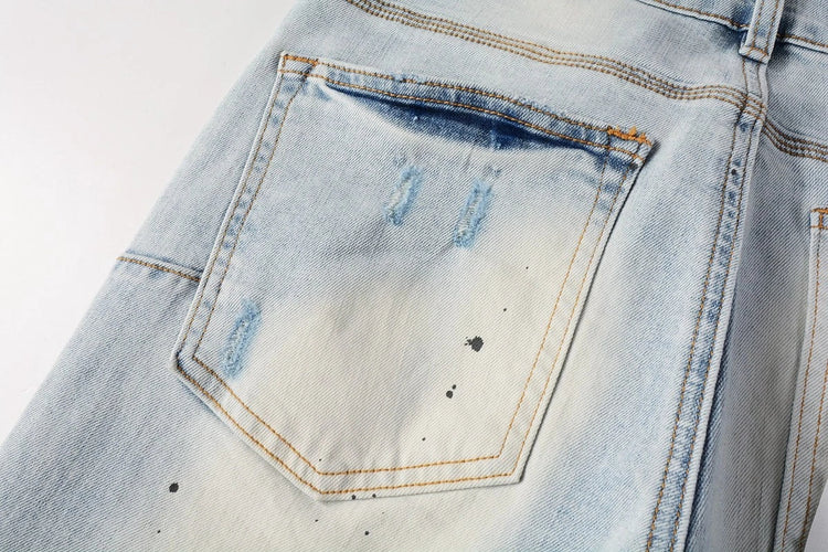 Close-up of Shanxi Stretchy Slim Straight Pants, showcasing the design and distressed details, featuring slim straight pants for men.
