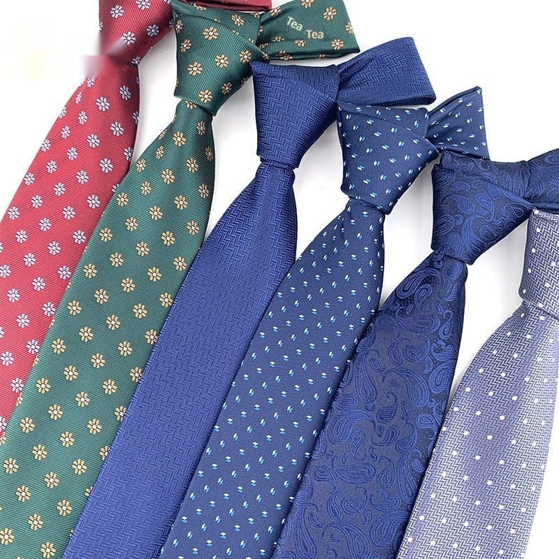 Mens jacquard woven business casual tie collection featuring floral and arrow-shaped designs.