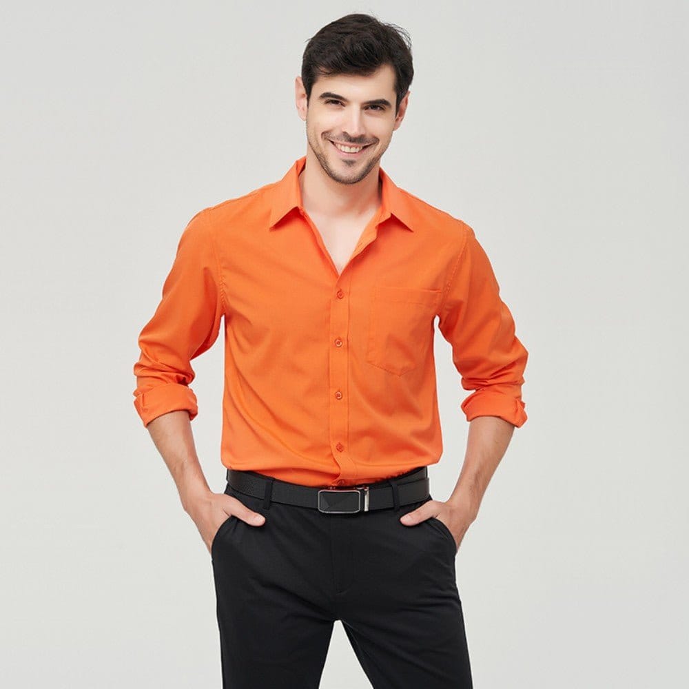 W7 business shirt polyester in vibrant orange color, worn by a smiling man with dark hair.