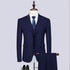 Stylish navy blue striped three-piece suit for men displayed on a mannequin, showcasing fashionable urban style.
