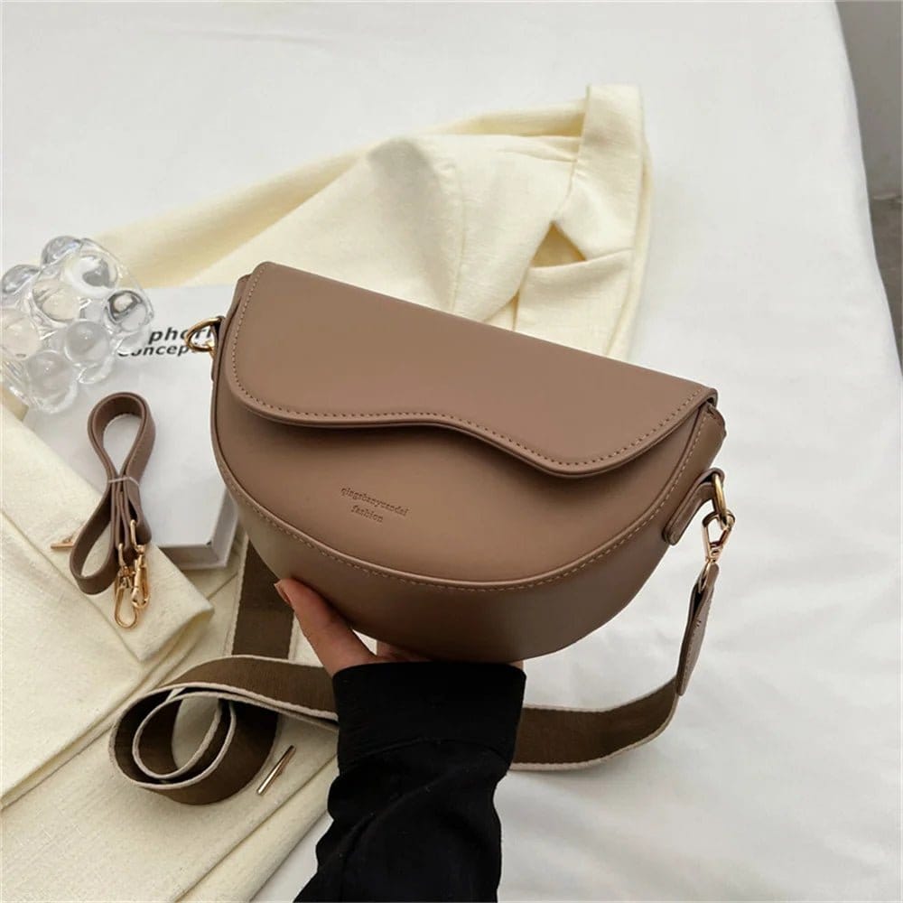 women's crossbody bags with stylish strap in a trendy brown color and modern design.