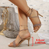 Rhinestone high heels for women showcasing their elegant design and fine heel, perfect for stylish occasions.