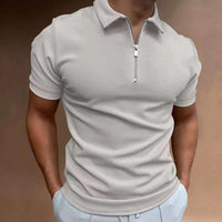 Men's casual polo shirt in light gray with short sleeves and zip collar for a stylish, relaxed look.