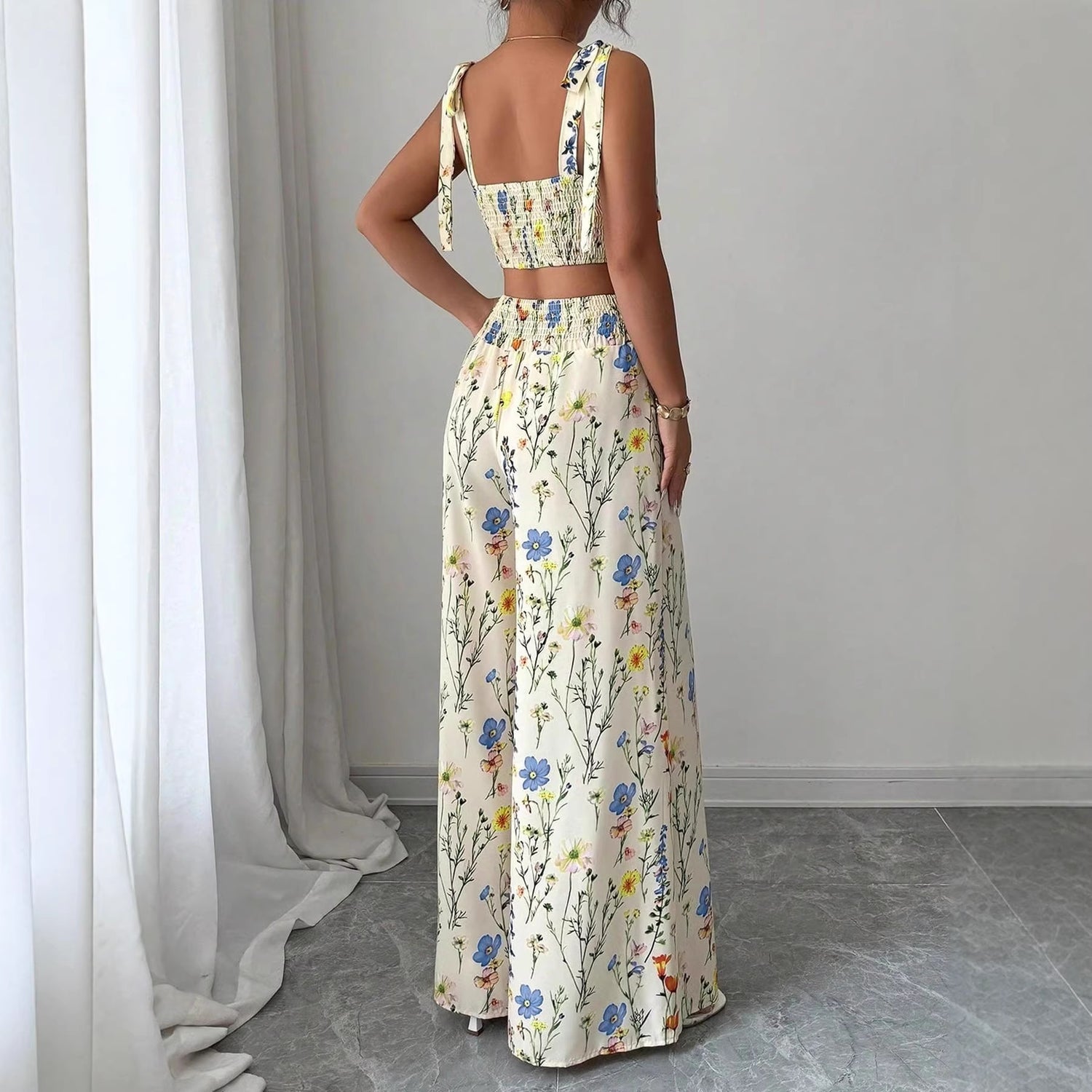 womens pyjama set printed camisole featuring floral design and stylish full-length pants.