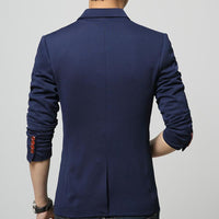 Back view of a slim fit one button blazer for men, showcasing its tailored design and button details.