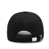 Back view of four seasons baseball cap, black cotton polyester design with adjustable strap.